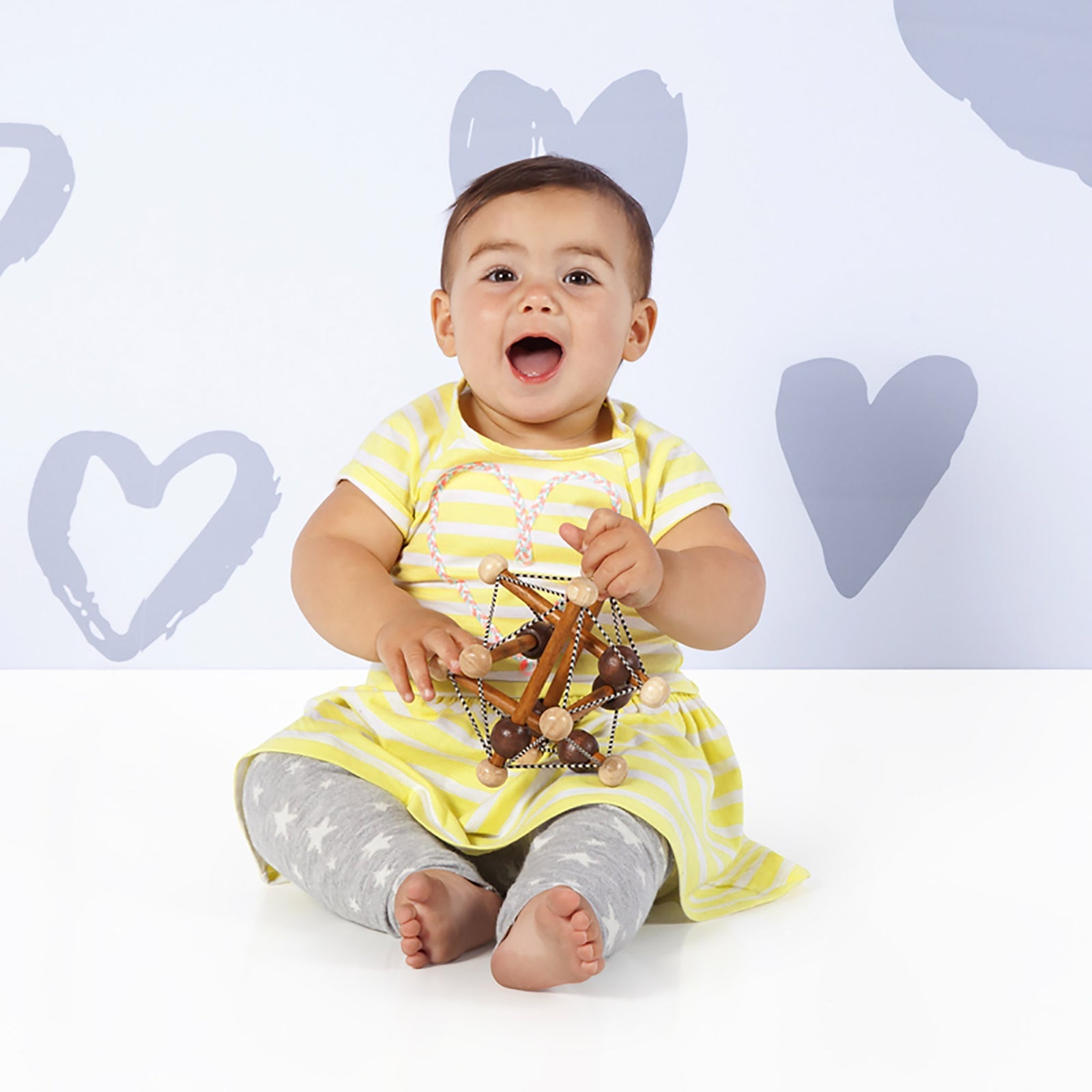 Manhattan Toy Artful Skwish Wooden Baby Rattle – Natural Wood Sensory Toy
