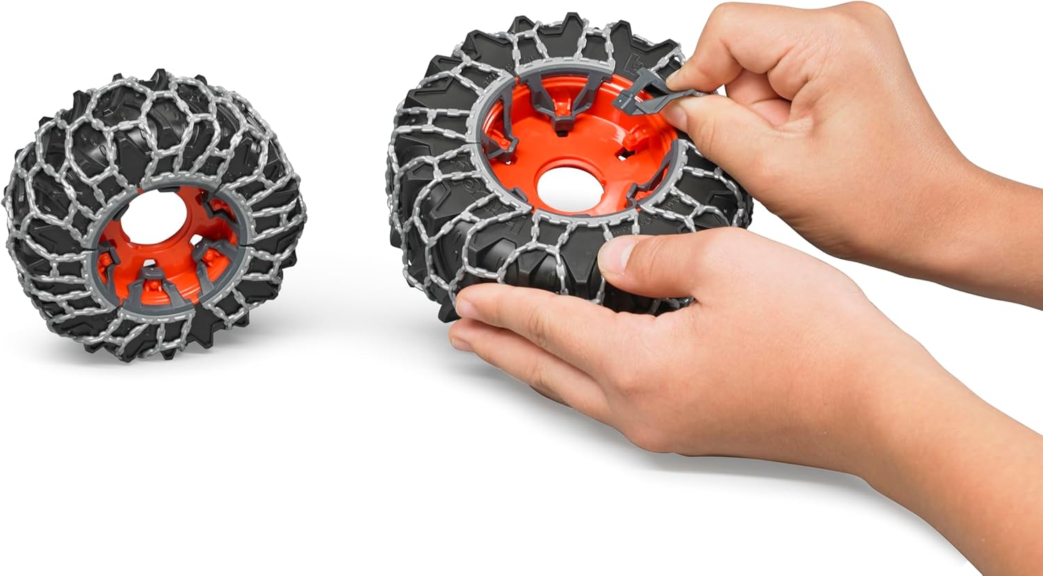 Bruder Class Axion 950 with Snow Chains and Plow Blade (03018)