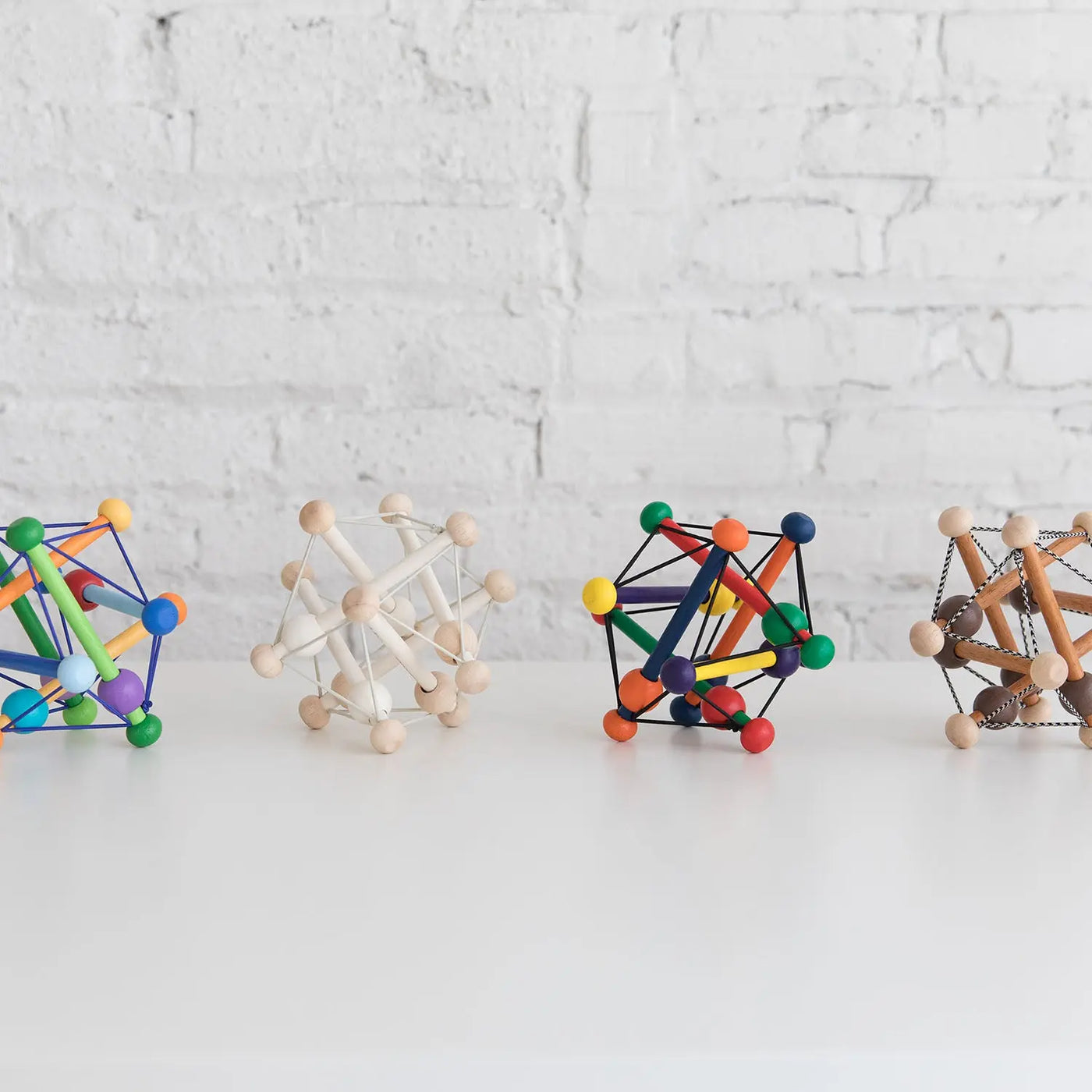 Manhattan Toy Skwish Classic Rattle & Teether – Iconic Wooden Baby Sensory Toy