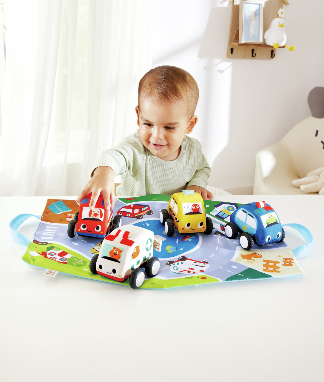 Hape Pull-Back Plush Car Set – 4 Soft Squeeze Cars with Foldable Road Mat Carrying Bag (Ages 12m+)
